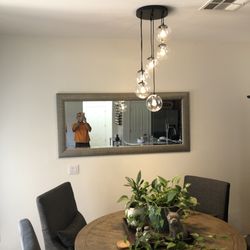 Lugo Handyman Services - New beautiful wall mirror hung and pendant lighting installed for a customer in her dining room.
