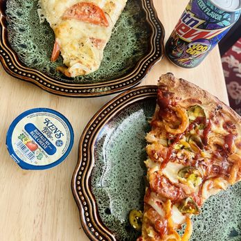 Macy’s Place Pizzeria - Left is white pizza. Right is bbq chicken fingers jalapeños and onion rings. Both amazing - Pizza Near Me - Clarence, New York Macy’s Place Pizzeria - Left is white pizza. Right is bbq chicken fingers jalapeños and onion rings. Both amazing - Pizza Near Me - Clarence, New York