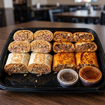 CocoRay's - Mixed Burrito Tray - catering menu image. Pickup and delivery options. Inquire at cocorays.net/contact?topic=catering. - Puerto Rican Near Me - Lawrence, Massachusetts CocoRay's - Mixed Burrito Tray - catering menu image. Pickup and delivery options. Inquire at cocorays.net/contact?topic=catering. - Puerto Rican Near Me - Lawrence, Massachusetts