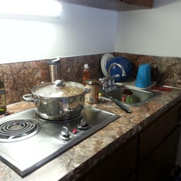 Makin' chili in the kitchenette! I feel like this should be part of a competition on the Food Network. Makin' chili in the kitchenette! I feel like this should be part of a competition on the Food Network.