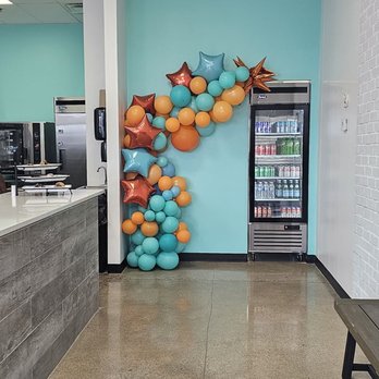 Dirty Dough-Blue Ash - a long counter with a bunch of balloons on it - Desserts Near Me - Blue Ash, Ohio Dirty Dough-Blue Ash - a long counter with a bunch of balloons on it - Desserts Near Me - Blue Ash, Ohio