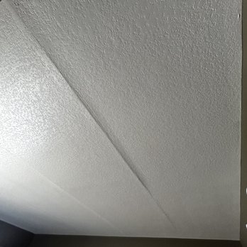Adventureland Inn - Drywall seams coming loose above bed - Hotels Near Me - Altoona, Iowa Adventureland Inn - Drywall seams coming loose above bed - Hotels Near Me - Altoona, Iowa