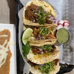Brothers Tacos - Barbacoa, Al Pastor, Chorizo and Shrimp Tacos.