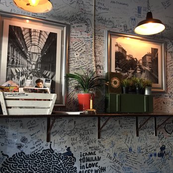 Sofa Café - Full of happy peoples Wall full of happy scribbles - Wine Bars Near Me - Milan, Michigan