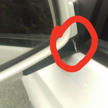 Caliber Collision - Overspray dripped and dried on side mirror - Body Shops Near Me - Austin, Texas
