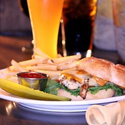 Sports Haven Bar & Grille - Southwest Chicken Sandwich- Grilled marinated chicken with Monterrey jack cheese, chipotle mayo, lettuce & tomato on a hard roll