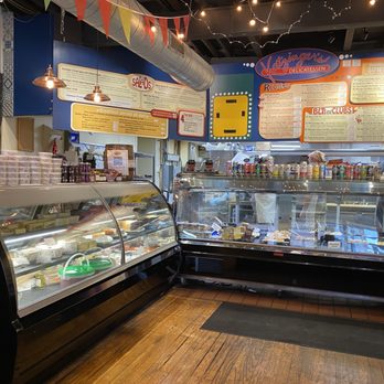 Katzinger's Delicatessen - More of the south case of meats, some of the salads and west wall with some of the menu before you reach the register to order and pay. - Delis Near Me - Columbus, Ohio Katzinger's Delicatessen - More of the south case of meats, some of the salads and west wall with some of the menu before you reach the register to order and pay. - Delis Near Me - Columbus, Ohio