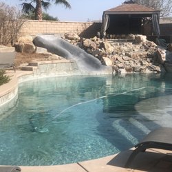 Saltwater pool jacuzzi and waterfall.