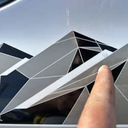 Cape & Islands Mitsubishi - Bubbles in the decals when I asked them if they could fix that they told me to "work them out with a card or something".