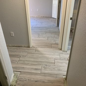 SA1 Construction - He made the floors seamlessly match through the condo, so there were no threshold transitions. - General Contractors Near Me - Huntington Beach, California