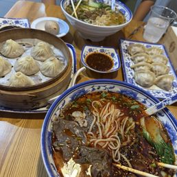 Spicy Beef Noodle Soup, Steamed Soup Dumplings (6) (6), Crispy Pork Dumplings(8)