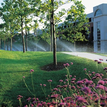 Lawn Systems - a sprinkler spraying water on a lawn - Landscaping Near Me - Fenton, Missouri Lawn Systems - a sprinkler spraying water on a lawn - Landscaping Near Me - Fenton, Missouri