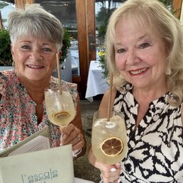 Outdoor patio overlooking water/boats enjoying Lemoncello Spritzers and bar menu tasties!! Outdoor patio overlooking water/boats enjoying Lemoncello Spritzers and bar menu tasties!!