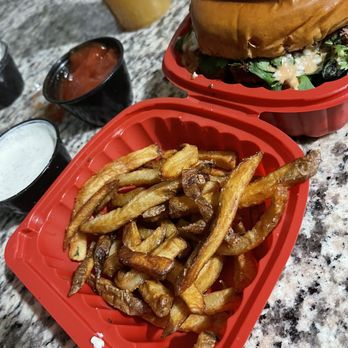 Manny's Restaurant - French fries and carne asada burger with extra cilantro. - Burgers Near Me - Victorville, California Manny's Restaurant - French fries and carne asada burger with extra cilantro. - Burgers Near Me - Victorville, California
