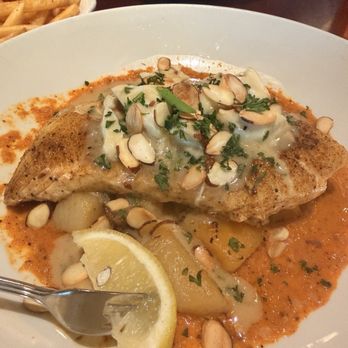 Pappadeaux Seafood Kitchen - Seasonal Halibut with crab on top - Seafood Near Me - Houston, Texas Pappadeaux Seafood Kitchen - Seasonal Halibut with crab on top - Seafood Near Me - Houston, Texas