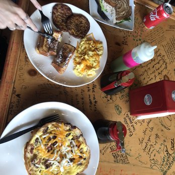 Heat Da Spot - My waffle+ omelet on the bottom ($15) and my friend's full breakfast on top ($13). Not really what I call a cheap meal.... - Coffee & Tea Near Me - Washington, DC, District of Columbia