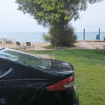 Pine Haven Resort - Car is in front of Cabin 7. That close to the beach - Resorts Near Me - Tawas City, Michigan