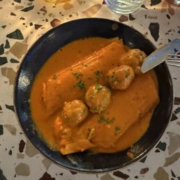 Manicotti in vodka sauce with meatballs