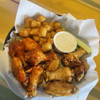 Hurricane Grill & Wings - Extra hot buffalo wings & lemon pepper with some tots on the side - American Near Me - Round Rock, Texas