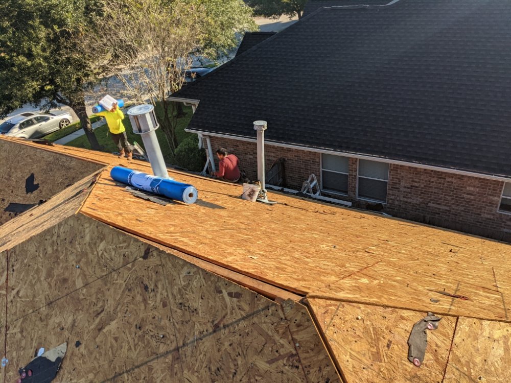 Slide of J&J Roofing Solutions