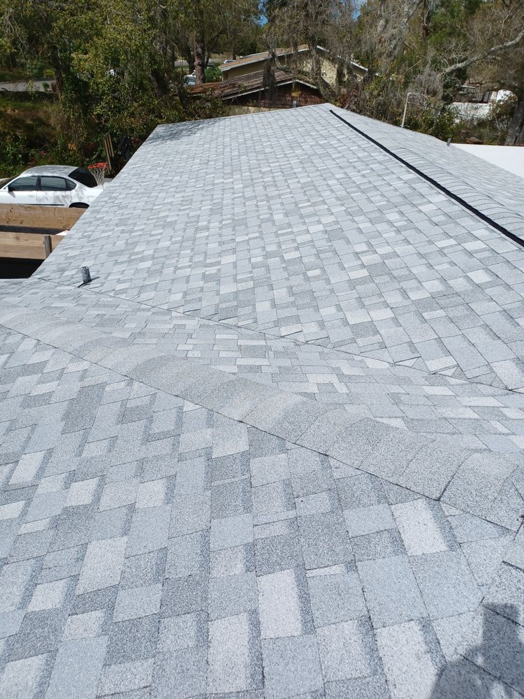 Slide of Dunedin Roofing