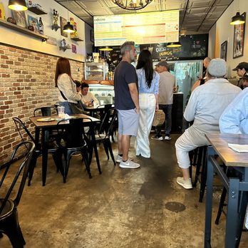 Cafecito - That empty table was where we sat, and the lady standing behind it took ownership just as we were walking away. - Cuban Near Me - Calabasas, California