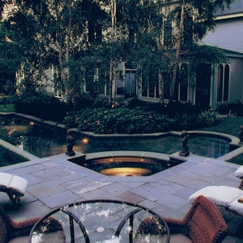 Shur Shot Gunite - a patio with chairs and a fire pit - General Contractors Near Me - Brookfield, Connecticut Shur Shot Gunite - a patio with chairs and a fire pit - General Contractors Near Me - Brookfield, Connecticut