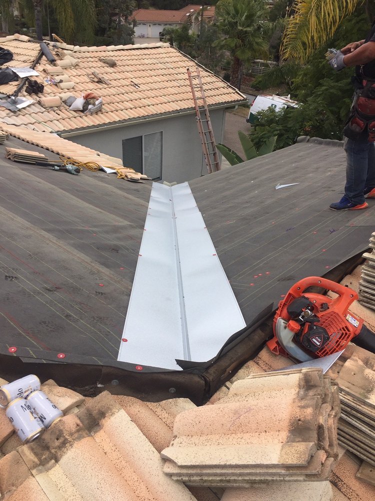 Slide of PC Roofing Services