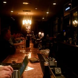 Even on a weekday nearing close,  the bar is still busy.