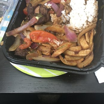 El Rocoto - Had already started eating but had just eaten 3 pieces of meat and only 3 more left..... mostly fries and rice for $19 - Peruvian Near Me - Cerritos, California
