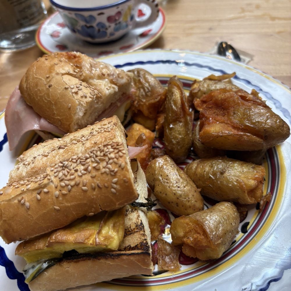 Breakfast sandwich and crispy potatoes