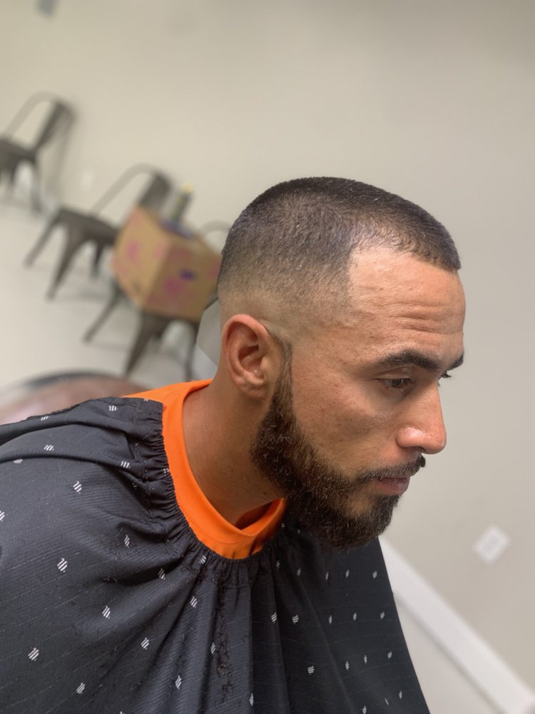 Xavi’s Barber Shop Logo