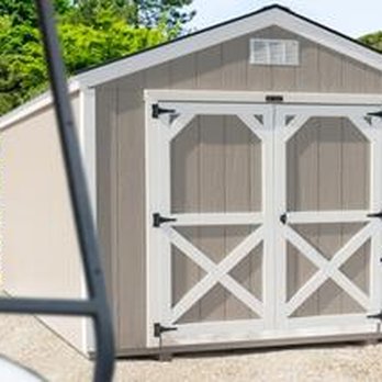 Foothills Sheds - a golf bag and a golf club in front of a shed - General Contractors Near Me - Forest City, North Carolina Foothills Sheds - a golf bag and a golf club in front of a shed - General Contractors Near Me - Forest City, North Carolina