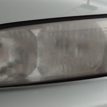 Curbside Detail - Left headlight before restoration. - Auto Detailing Near Me - Clovis, California Curbside Detail - Left headlight before restoration. - Auto Detailing Near Me - Clovis, California