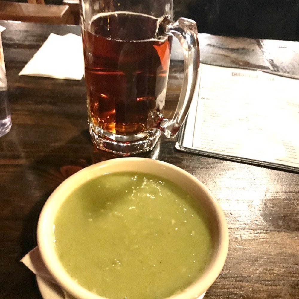Cornish Pasty Co - Mushy Peas Guarded by massive 34 ounce draft ale - British Near Me - Flagstaff, Arizona
