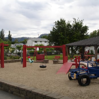 Sandy Beach Suites - Playground at SBM, another way for the kids to have fun.  Note v-ball court and covered grill/dining area. - Hotels Near Me - Osoyoos, British Columbia