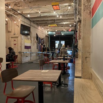 Cloudburst Brewing - Seating area looking out to the street - Breweries Near Me - Seattle, Washington
