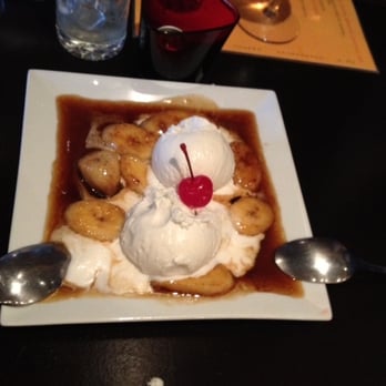 La Cocina Boricua - Amor Dulce- a delicious dessert of lightly fried sweet plantains in a caramel rum sauce served over vanilla ice cream. - Puerto Rican Near Me - Bronx, New York La Cocina Boricua - Amor Dulce- a delicious dessert of lightly fried sweet plantains in a caramel rum sauce served over vanilla ice cream. - Puerto Rican Near Me - Bronx, New York