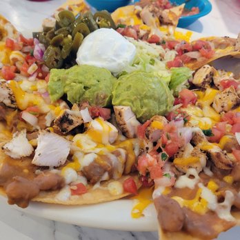 Chuy's - Panchos, with fajita chicken meat. Excellent - Tex-Mex Near Me - Austin, Texas