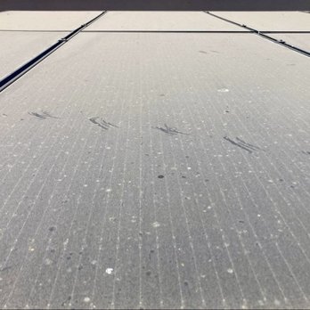 Harris Solar Panel Cleaning and Bird Proofing - Yep, those are bird tracks of our dinghy panels. - Solar Panel Cleaning Near Me
