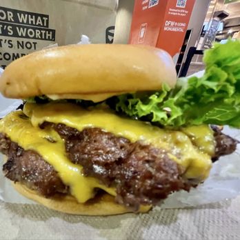 Shake Shack - Shake Shack double: Cheese, two patties, lettuce, tomato, shake sauce. - Fast Food Near Me - Dallas, Texas Shake Shack - Shake Shack double: Cheese, two patties, lettuce, tomato, shake sauce. - Fast Food Near Me - Dallas, Texas