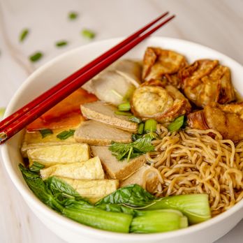 Loving Hut - Tasty wonton with vegan protein over wheat noodle ; served with bok choy & fresh herbs - Vegan Near Me - San Jose, California Loving Hut - Tasty wonton with vegan protein over wheat noodle ; served with bok choy & fresh herbs - Vegan Near Me - San Jose, California