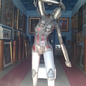 NoHo Gallery and Framing - A mechanical man made of metals of different kinds. True work of art. All types of different paintings on the walls. - Framing Near Me - North Hollywood, California NoHo Gallery and Framing - A mechanical man made of metals of different kinds. True work of art. All types of different paintings on the walls. - Framing Near Me - North Hollywood, California
