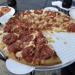 Our pizza out front on the patio furniture. Our pizza out front on the patio furniture.