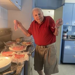 My Dad, making sandwiches for us