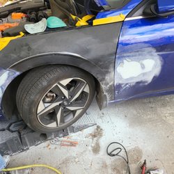 Same Day Bumper and Collision Repair - Work being done on the bumper and door. Full quarter panel replacement