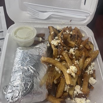 Krilakis - Feta Fríes and turkey melt before it is unwrapped with their homemade Side of Tzatziki Sauce - Greek Near Me - Ridgeland, Mississippi