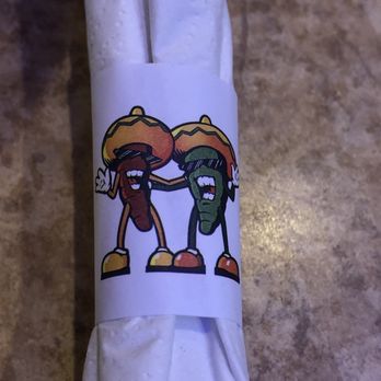Mi Pueblo - a napkin with a picture of two cartoon characters on it - Tex-Mex Near Me - Richland Hills, Texas Mi Pueblo - a napkin with a picture of two cartoon characters on it - Tex-Mex Near Me - Richland Hills, Texas