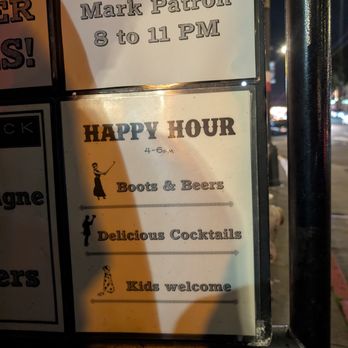 Comstock Saloon - Happy hour sign - Lounges Near Me - San Francisco, California