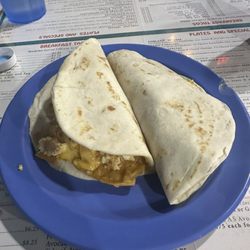 Oasis Cafe - Chilaquiles taco and carne guisada taco with cheese. SO GOOD!